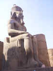 Seated statue of Ramses II inside Luxor Temple