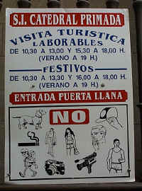 When all else fails, use pictures - entrance sign at a cathedral in Spain