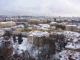 View of snow dusted Old Town from the Prague Castle Steps