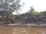 Life just drifts by in a this typical river village