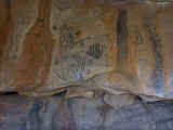 Aboriginal artwork adorning the walls of a cave
