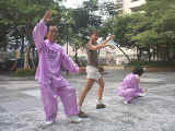 Laura practices her Tai Chi with William and Pandora