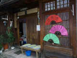 Menus posted on fans outside this inviting tea house